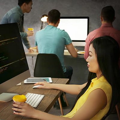 Young programmer working in office